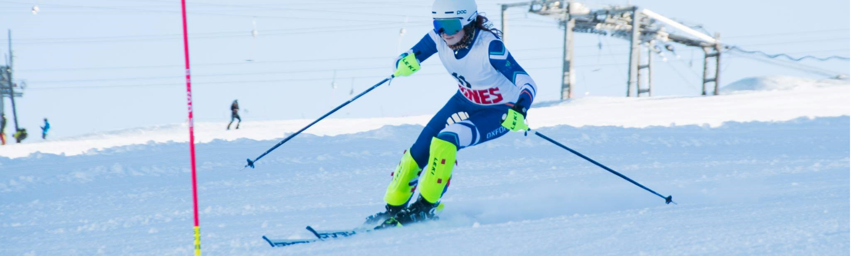 A skier tackling a slalom course