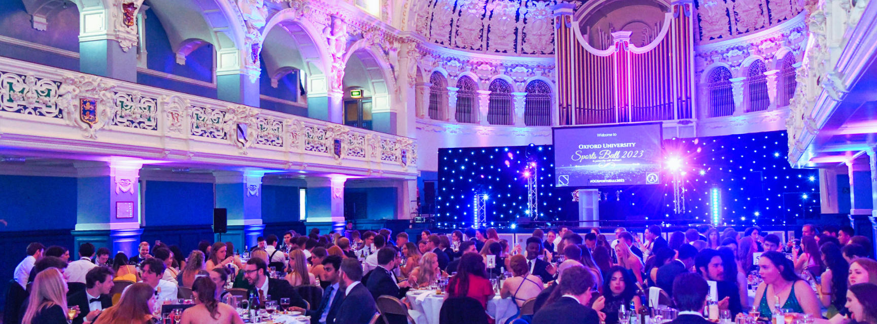 Sports Ball 2023 Image of students seated at Sports Ball in Oxford Town Hall