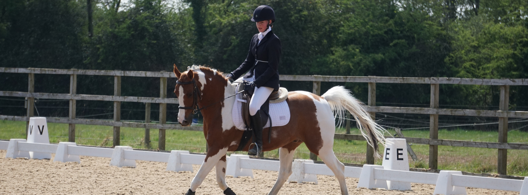Image of Equestrian club member on a horse
