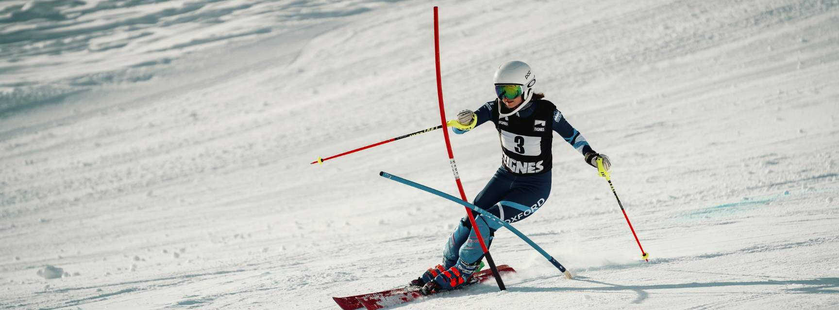 A skier tackling a slalom course