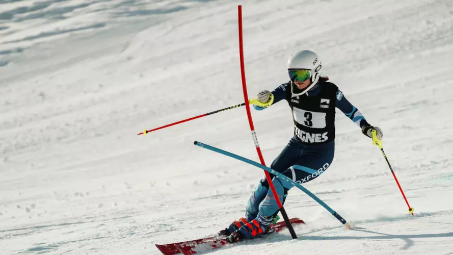 A skier tackling a slalom course
